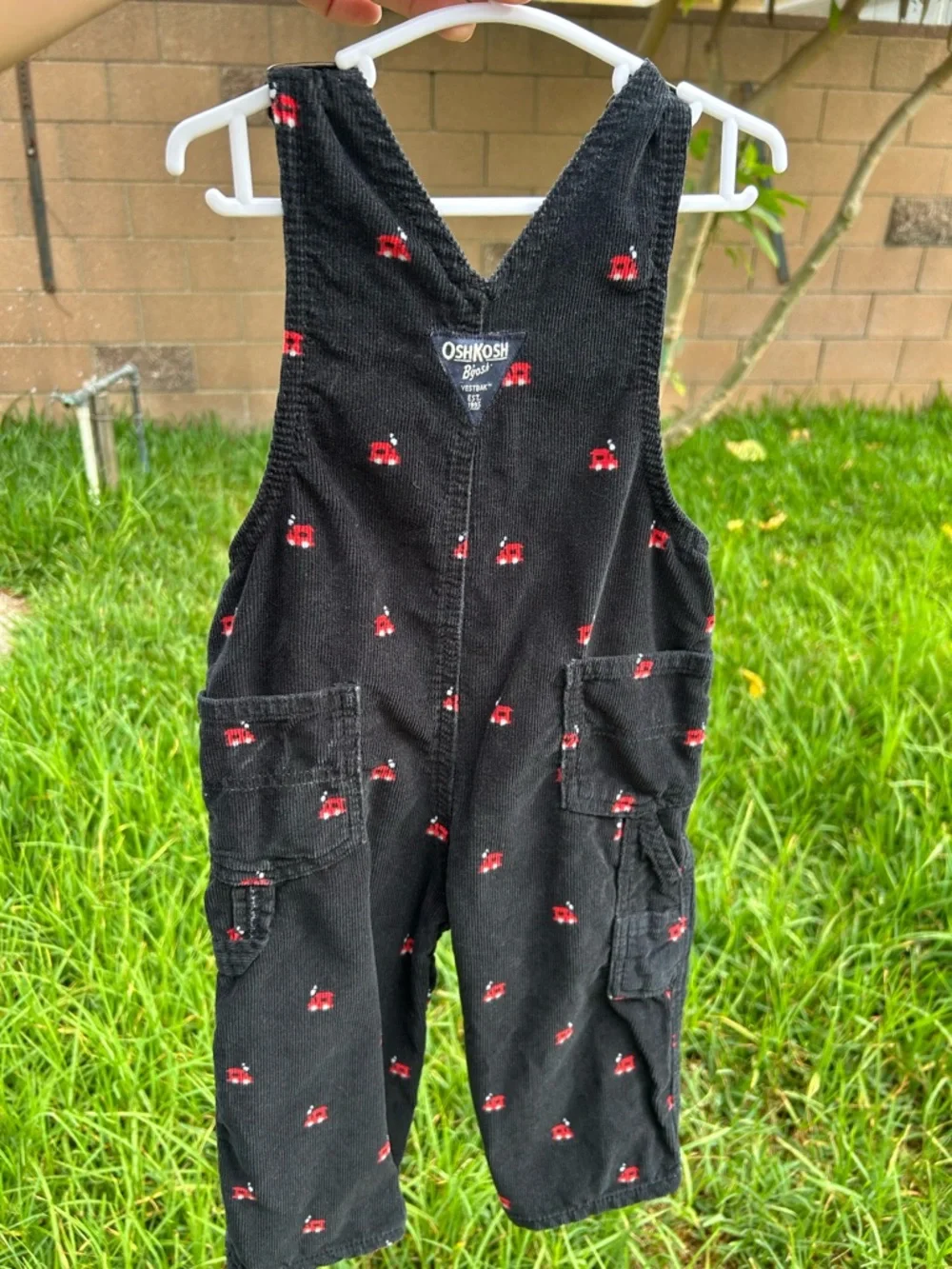 OshKosh B'gosh Black Corduroy Overalls with Red train print